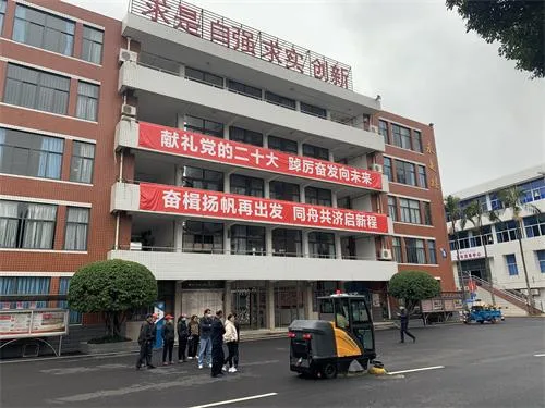 NanboC190 Fully Enclosed Road Sweeper serving a school