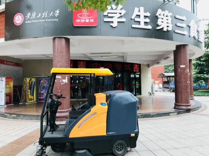 NanboC180 Semi-enclosed Ride-on Sweeper serving a university cafeteria in Wuhu