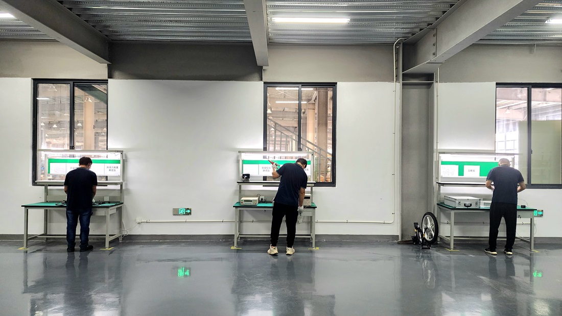 Nanbo R&D laboratory — engineers testing and validating cleaning equipment prototypes